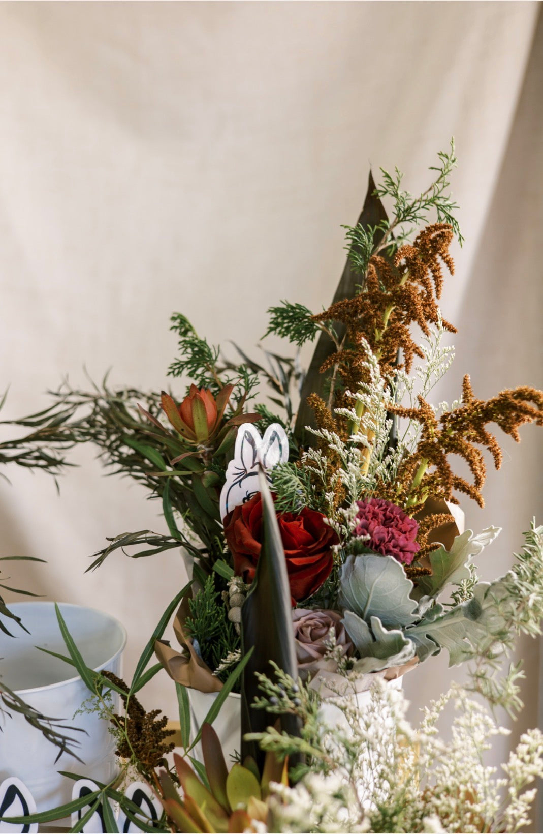 7/23 5:30pm: Glaze your own 6” Cow skull with red flowers tile and create a floral bouquet with Bunnytail Blooms by Bun Bun Vending